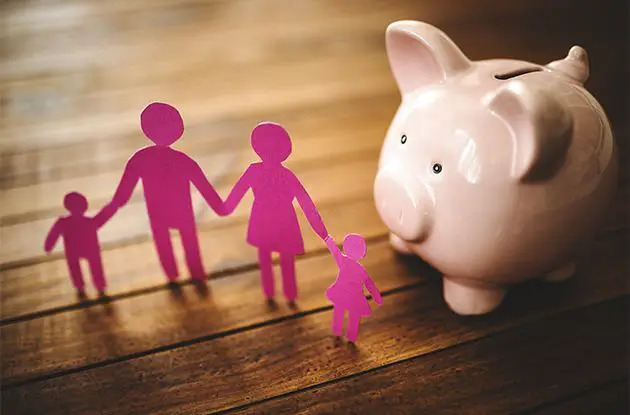 Piggy bank and paper family