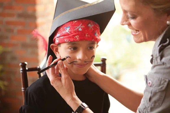 pirate party boy getting mustache