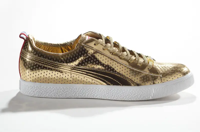 puma x undefeated clyde gametime gold sneaker