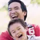 Dad and Son Laughing