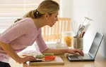 Woman searching online for a recipe