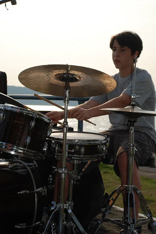 boy playing drums
