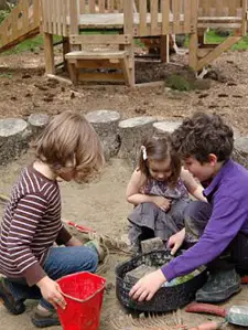 kids playing in sandbox