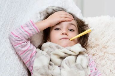 sick-girl-with-thermometer