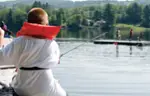 boy fishing off dock