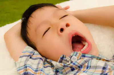 sleeping asian boy