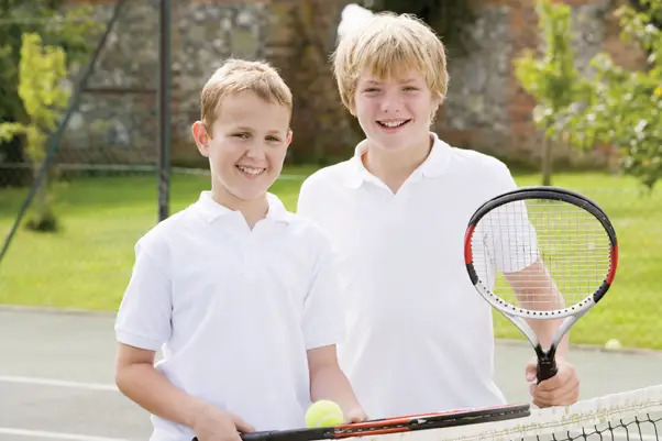 children playing tennis