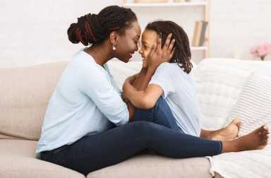 Happy,Family.,African,Mom,Embracing,Her,Daughter,With,Love,,Black