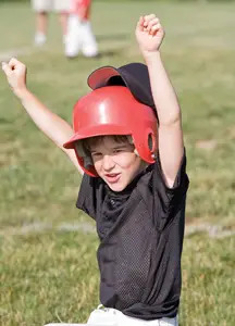 child with special needs playing baseball; special needs sports