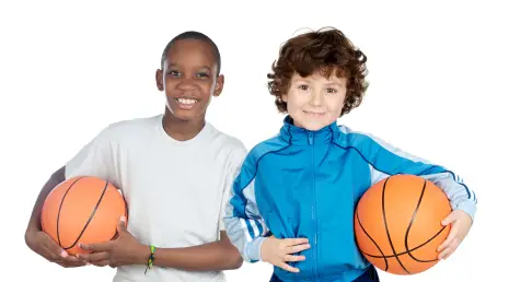 Boys holding basketballs