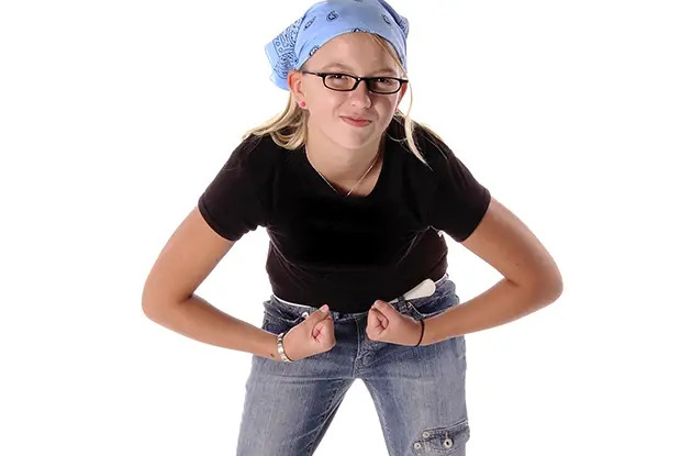 strong girl making muscles