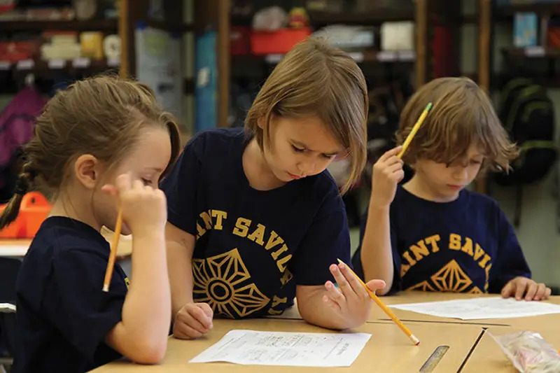 children working on school work