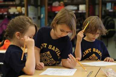 students-at-st-saviour-academy-doing-school-work