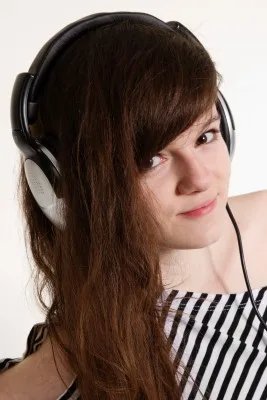 teen girl wearing headphones