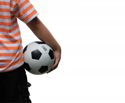 boy holding soccer ball