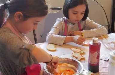 two-girls-decorating-sugar-cookies