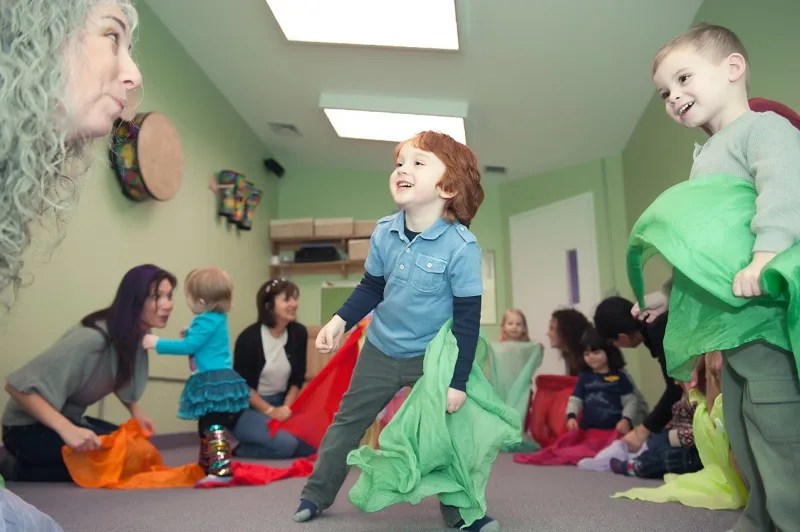 children and teacher in music class