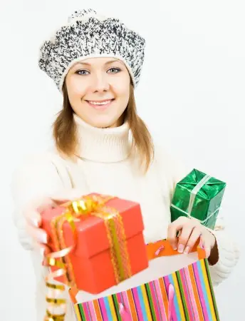 woman holding wrapped presents