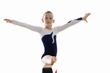 young-gymnast-on-balance-beam