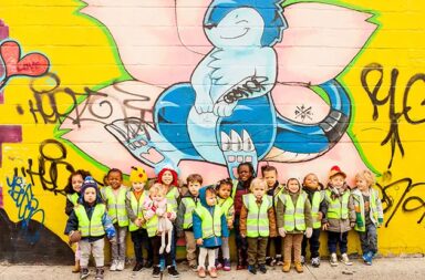 young-students-group-photo-mural-wall