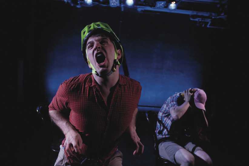 Performer acting like a dinosaur