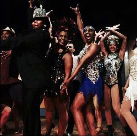 Dancers performing on a stage. 