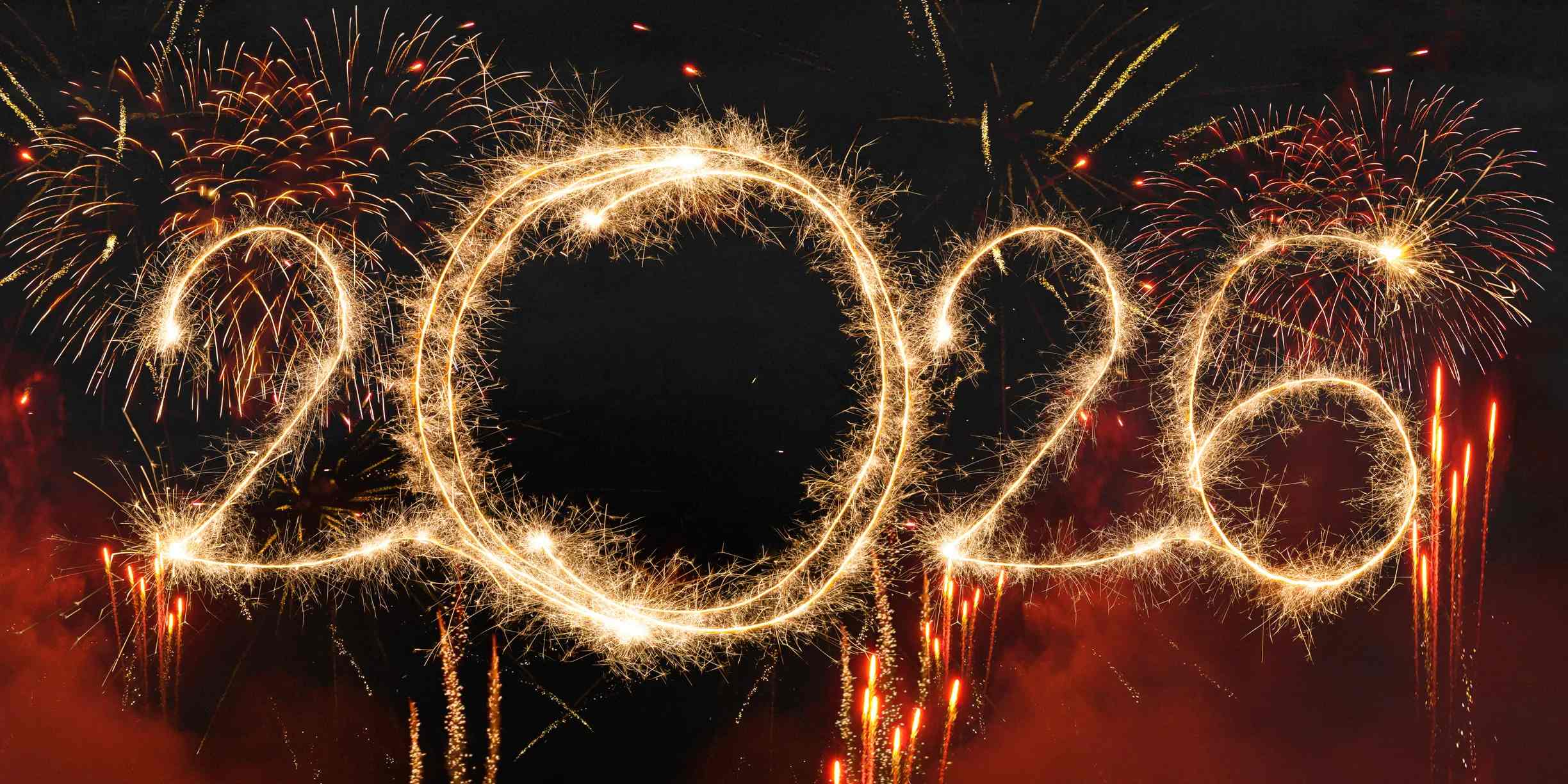 Brightly lit fireworks displaying 2026 for list of Where to Watch New Year’s Eve Fireworks in NYC With Kids