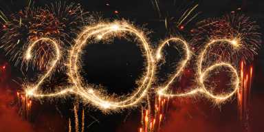 Brightly lit fireworks displaying 2026 for list of Where to Watch New Year’s Eve Fireworks in NYC With Kids