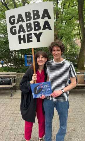 Author Jay Ruttenberg and illustrator Lucinda Schreiber stand together with their book.