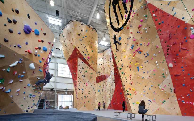 Tall indoor rope climbing walls at Brooklyn Boulders in Long Island City Queens