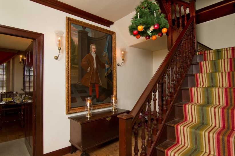 Staircase and painting at Van Cortlandt Manor, part of the American Revolutionary Trail in Westchester