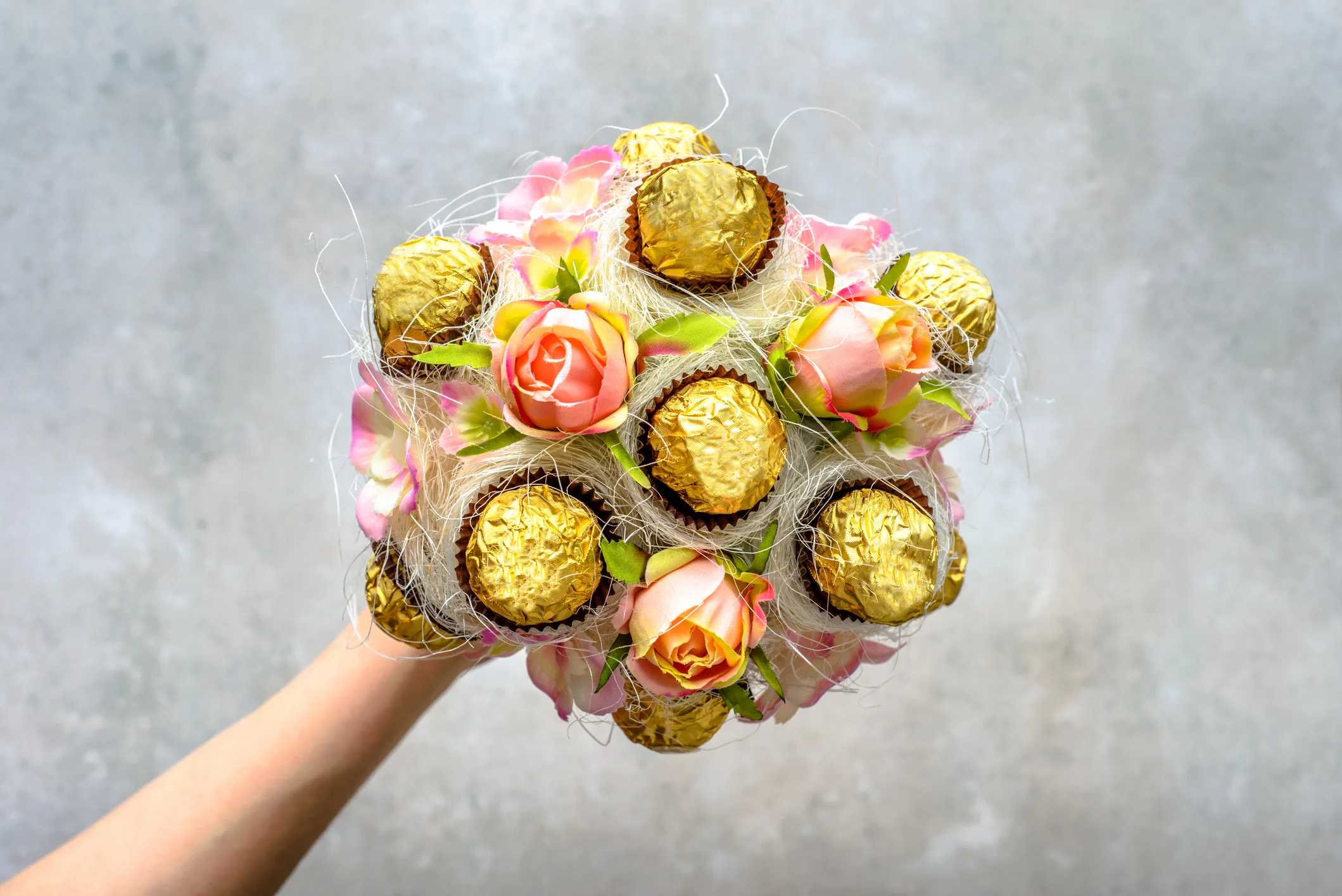 Cute, Easy, and Doable Valentine’s Day Gift Baskets for Kids: Valentine's Day flower bouquet made with chocolates