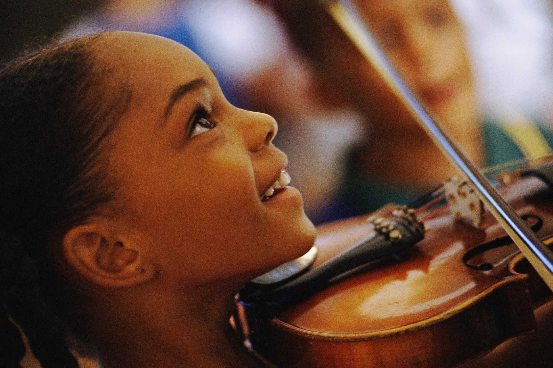 Music Activities for Kids in NYC: Girl playing the violin