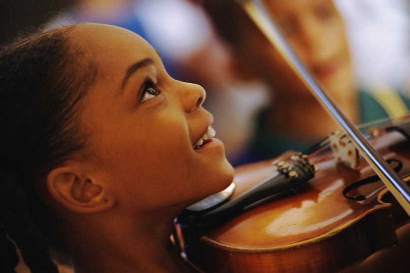 Music Activities for Kids in NYC: Girl playing the violin
