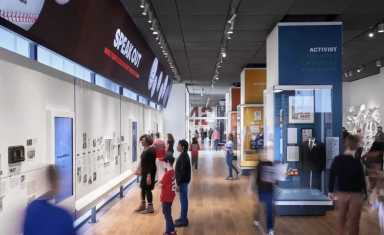 People admiring artwork in the Jackie Robinson Museum, one of the many Things to DO with Kids in NYC this weekend