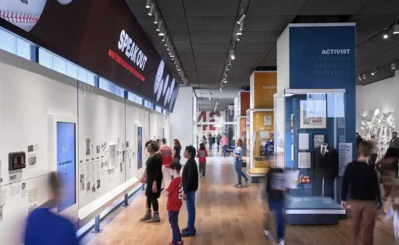 People admiring artwork in the Jackie Robinson Museum, one of the many Things to DO with Kids in NYC this weekend