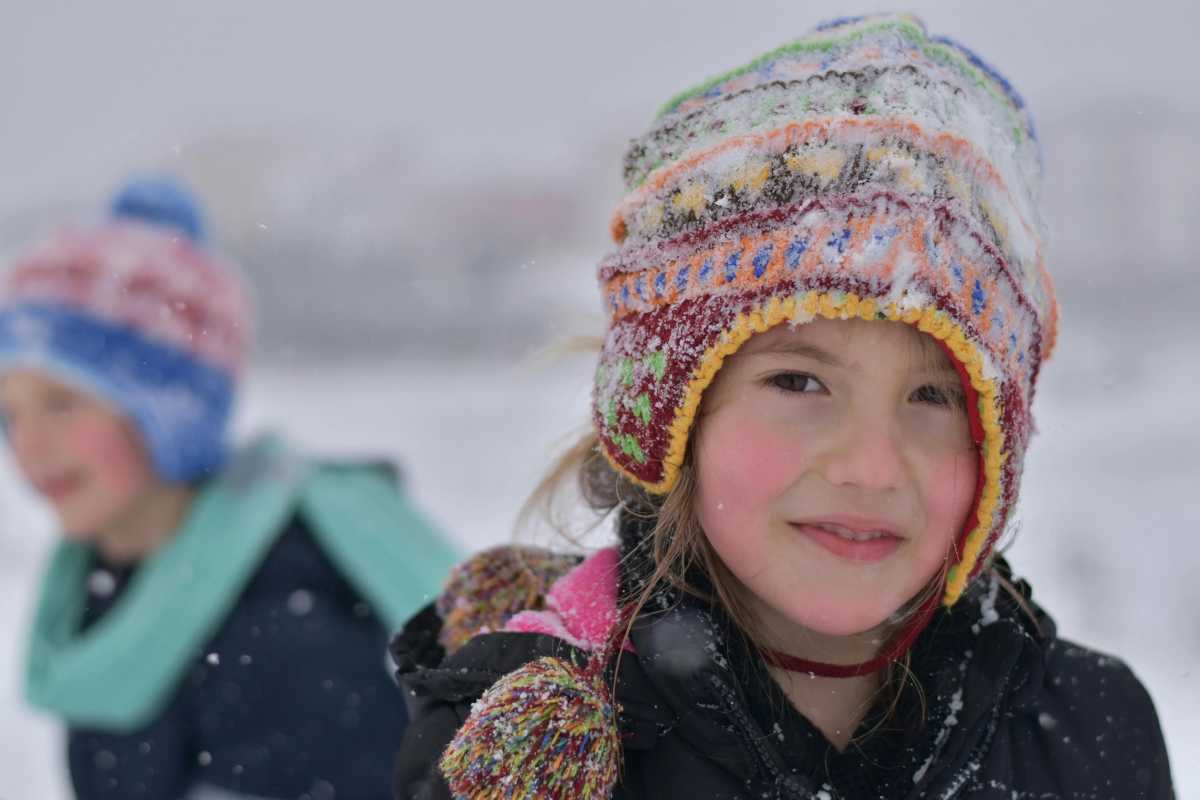 girl outside in a winter hat