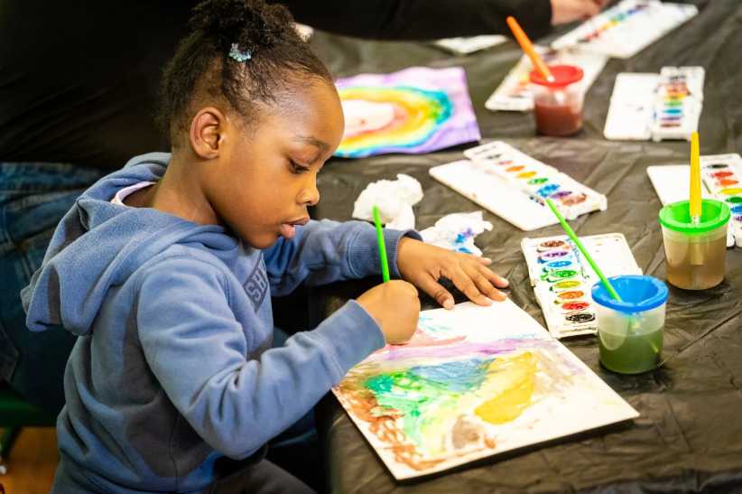 Young girl drawing at Children's Museum of Manhattan (CMOM) and the Whitney Museum of American Art Team Up For Joint Spring Programming for Kids