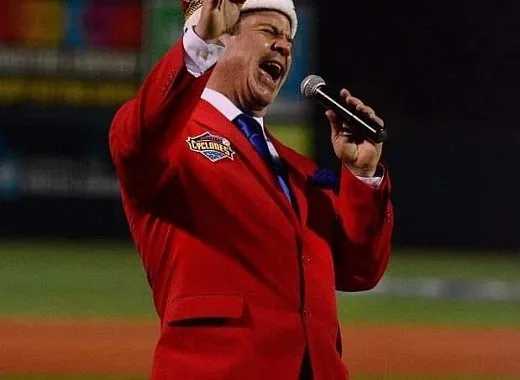 Man dressed in red Cyclones blazer. 